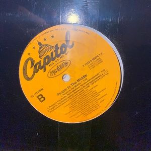 spearhead people in the middle 12” Sealed New